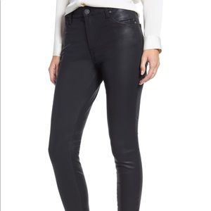 Black coated skinny jeans from topshop size 32